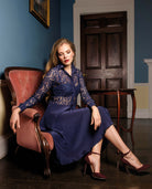 Model wearing midnight blue Lace Midi Dress