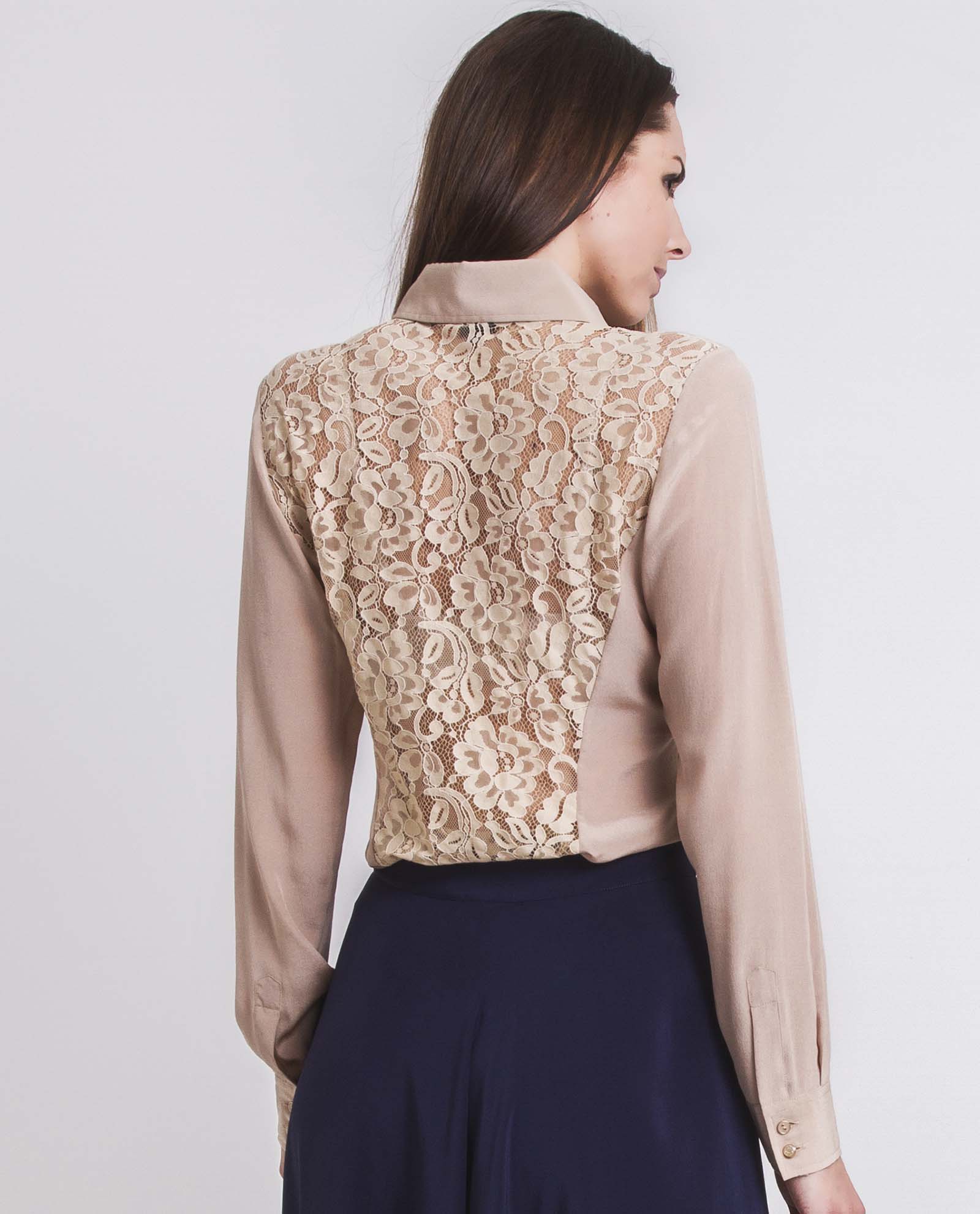 Back of women's beige silk shirt with lace back cut out