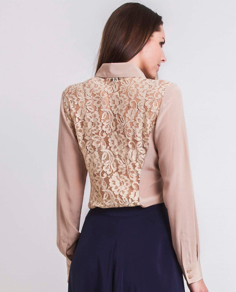 Back of women's beige silk shirt with lace back cut out